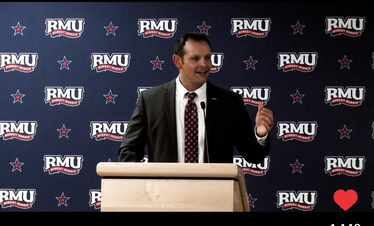 Armand Buzzelli moderating at the RMU podium